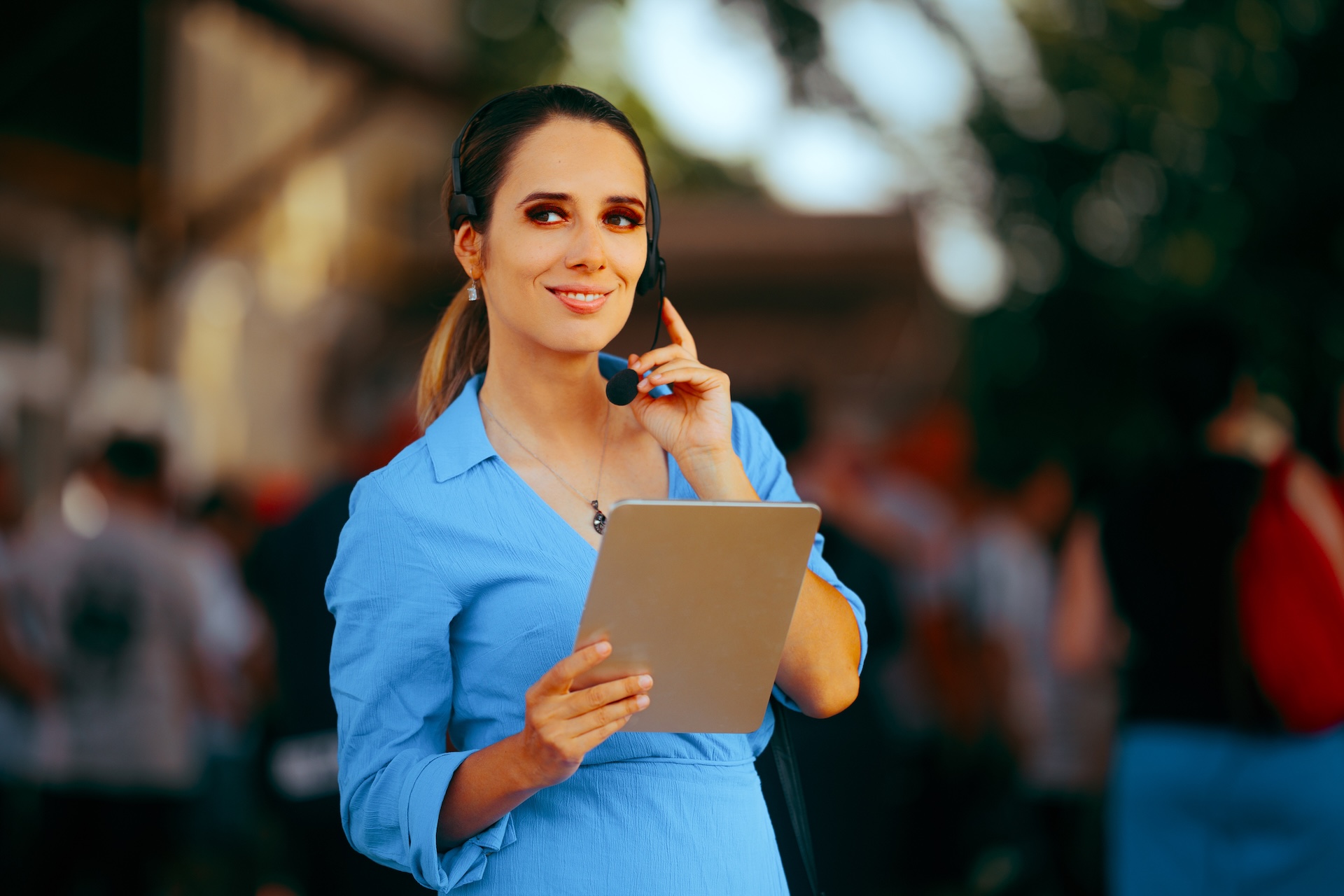 Event Organizer Wearing a Headset using event management servisces